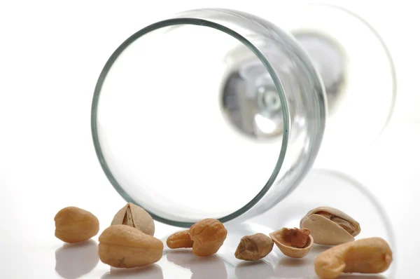 Glass and nuts — Stock Photo, Image