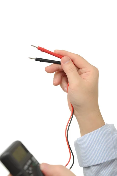Elektricien bezit een elektrische meter — Stockfoto