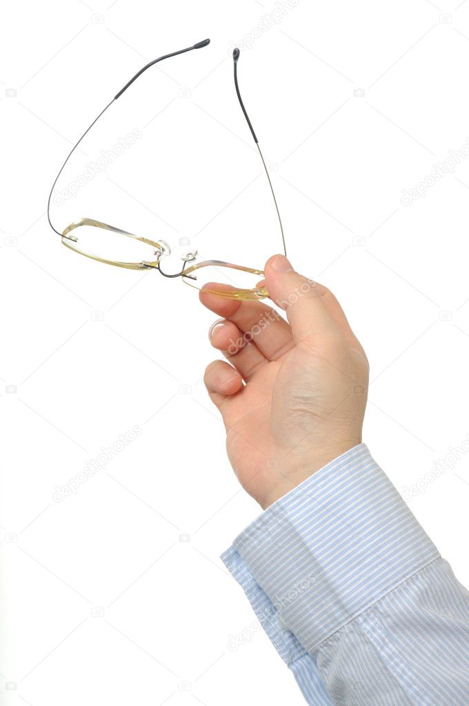 Businessman holding eyeglasses