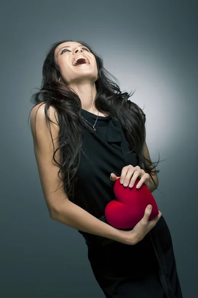 Valentines den. krásná usměvavá žena s dárkem — Stock fotografie