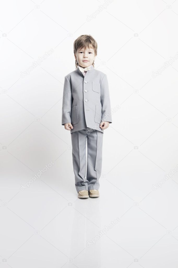 Portrait of a beautiful little boy in a festive costume