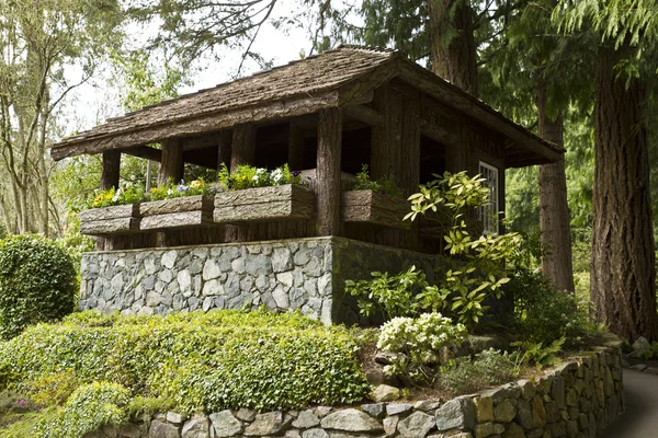 Cabaña de madera y piedra — Foto de Stock