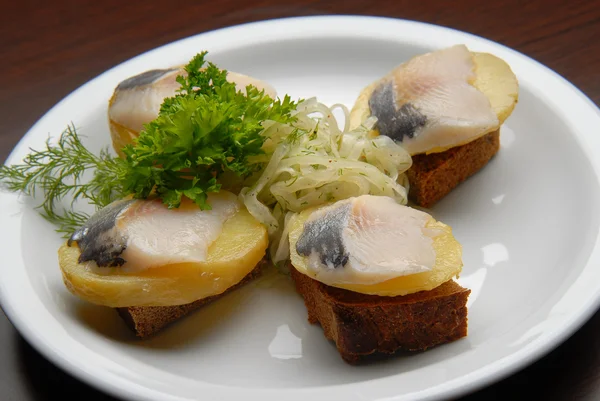 Snacks with salt fish — Stock Photo, Image