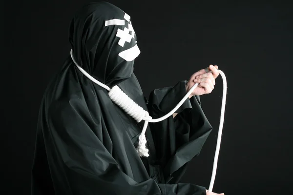 Schwarze Pantomime mit Seil am Hals — Stockfoto