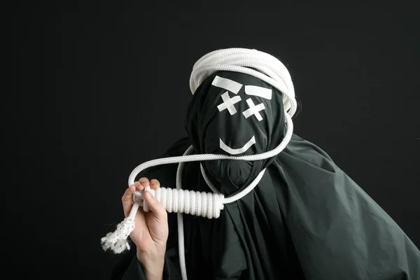 Zwarte mime met touw op nek — Stockfoto