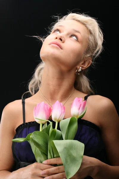 Chica y tulipanes — Foto de Stock