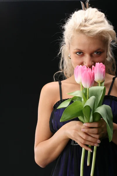 Girl and tulips — Stock Photo, Image