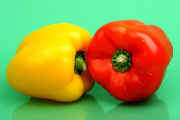 Paprika on green — Stockfoto