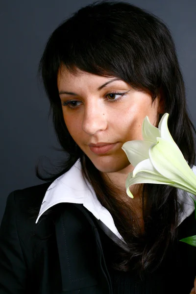 Beautiful girl with lily — Stock Photo, Image