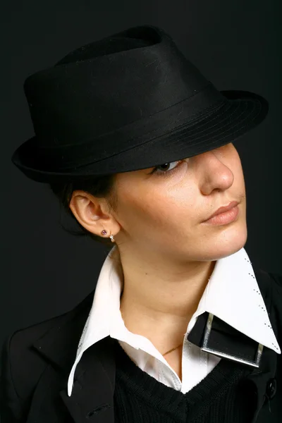 Portrait od beautiful girl in black hat — Stock Photo, Image