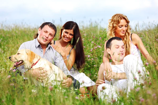 Friends and dog — Stock Photo, Image