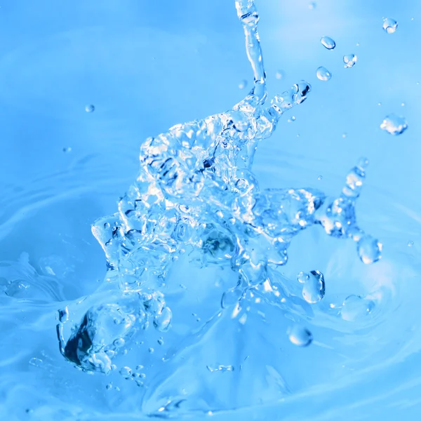 Salpicos de água azul — Fotografia de Stock