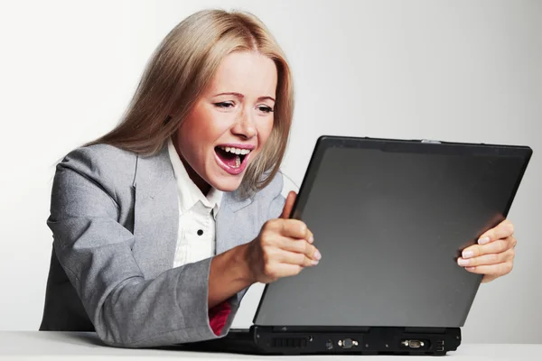 Business woman working on laptop Stock Image