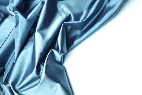 Niebieska satyna na białym tle — Zdjęcie stockowe