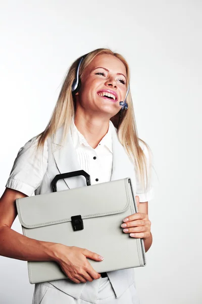 Podnikání žena v sluchátka — Stock fotografie