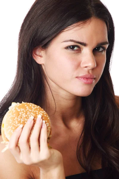 女性のハンバーガーを食べる — ストック写真