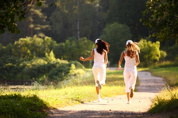 As mulheres correm — Fotografia de Stock