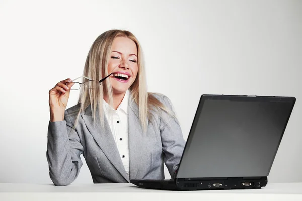 Business woman working on laptop Royalty Free Stock Photos