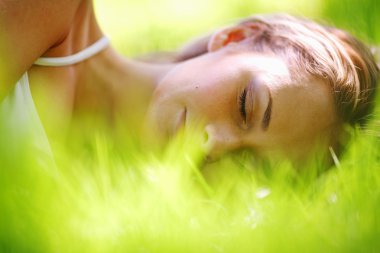 Woman sleep on grass clipart