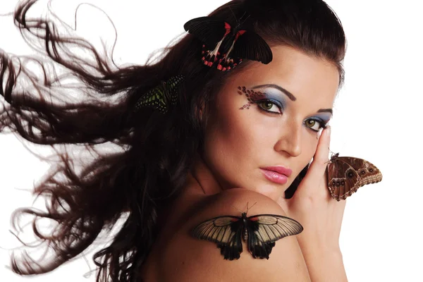 Žena a motýl — Stock fotografie