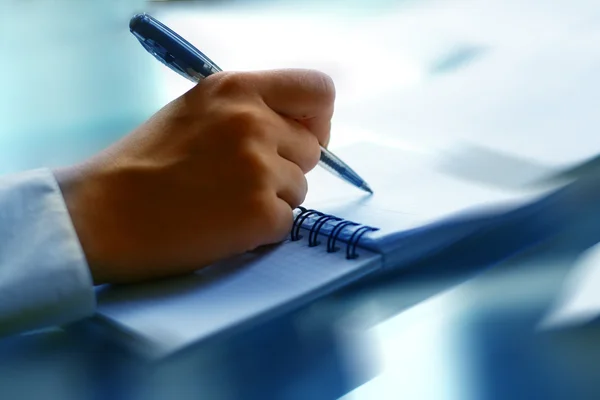 Write in note Stock Image