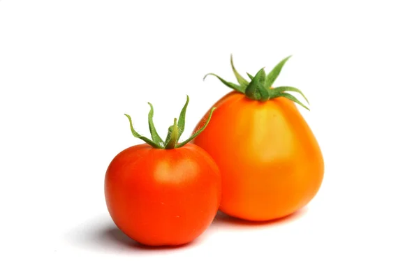 Czerwony pomidor stos na biały — Zdjęcie stockowe