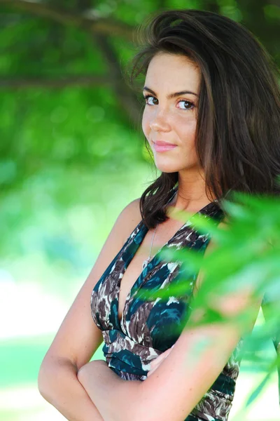 Stock image Girl on a background of green trees