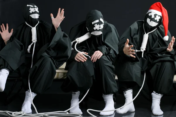 Black mimes with rope on neck — Stock Photo, Image