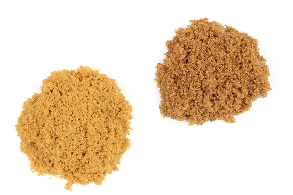 Twee typen bruine suiker op emmers. — Stockfoto