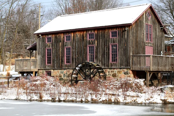 Old water mill in Waterloo, Ontario in snowy day. — Stock Photo, Image