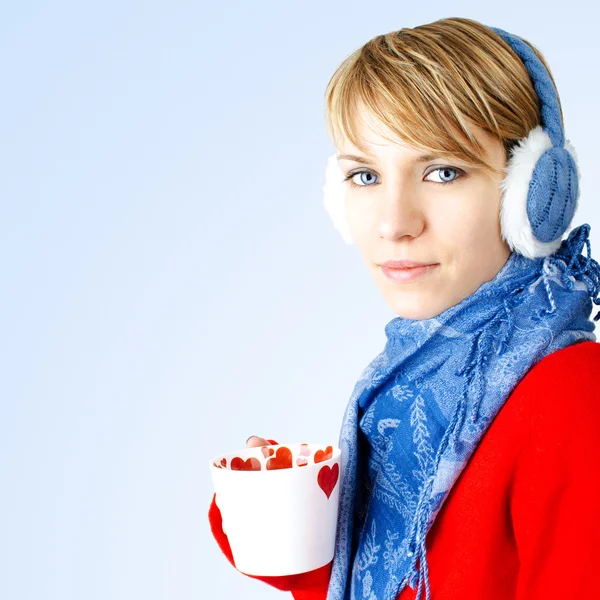 Girl holds cup of hot chocolate — Stock Photo, Image