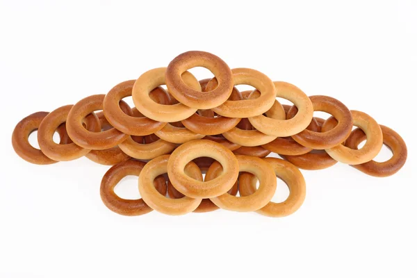 Little bagels nicely stacked on a white — Stock Photo, Image