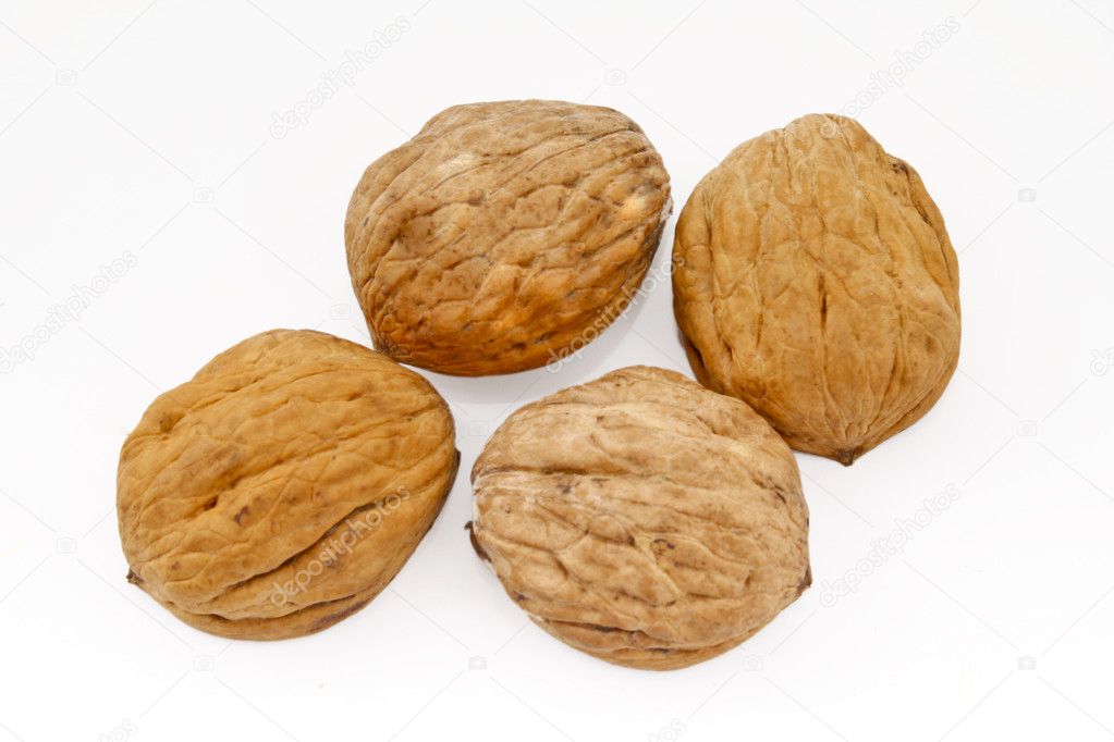 Walnuts isolated on a white background.