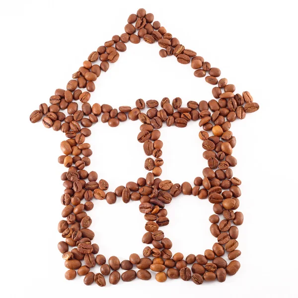 stock image House icon is lined with coffee beans on white background