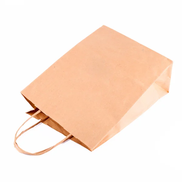 Shopping sacchetto di carta beige isolato su bianco — Foto Stock