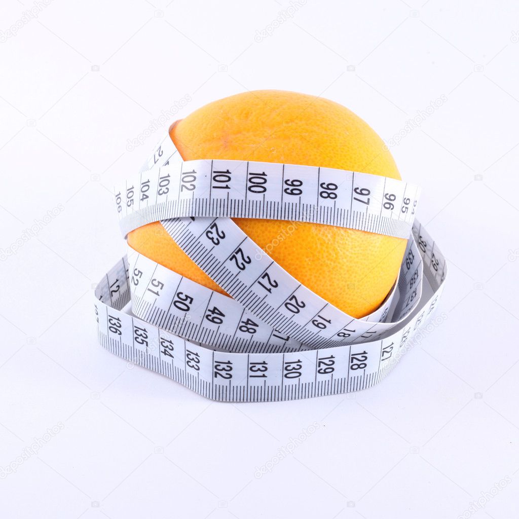 Fresh ripe grapefruit with measure tape
