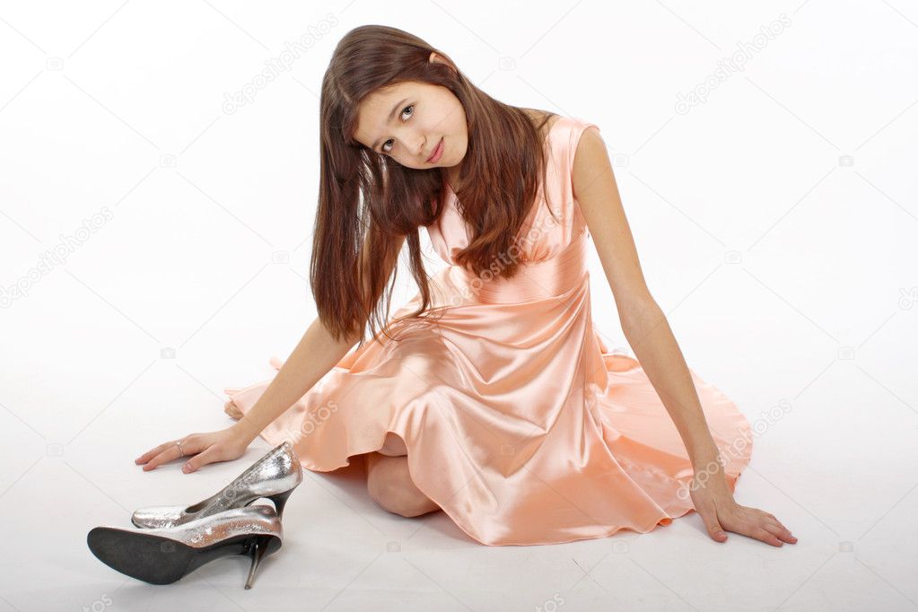Portret of the nice teen girl in pink clothes Stock Photo by