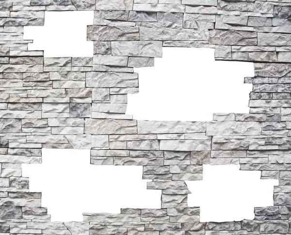 Una pared de piedra con ventanas blancas — Foto de Stock