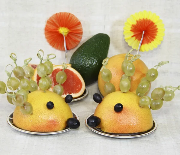 Ridiculous hedgehogs from fruit — Stock Photo, Image