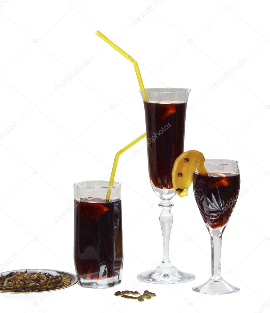Three glasses of mulled wine on white background