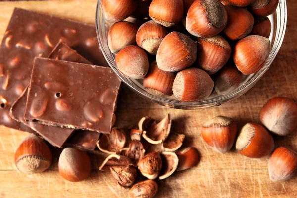 stock image Bowl of hazelnuts and chocolate