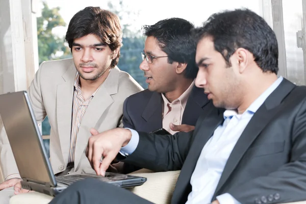 Three businessmen in meeting — Stock Photo, Image