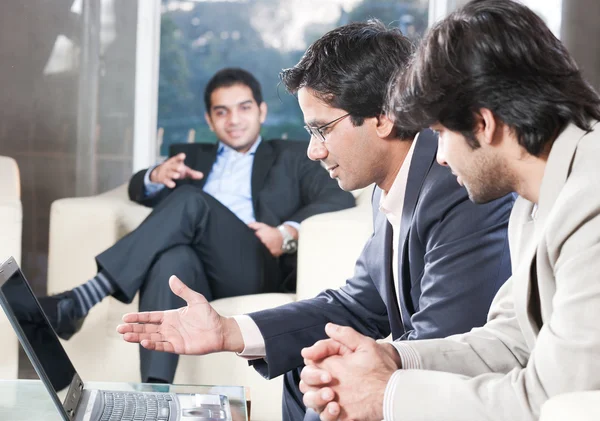Businessmen in meeting Stock Picture