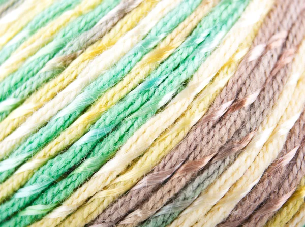 Green, yellow and brown knitted yarn — Stock Photo, Image