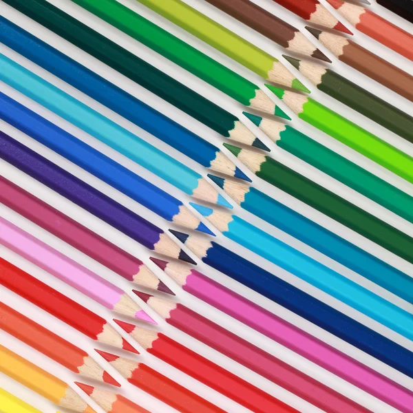Crayons em uma linha — Fotografia de Stock