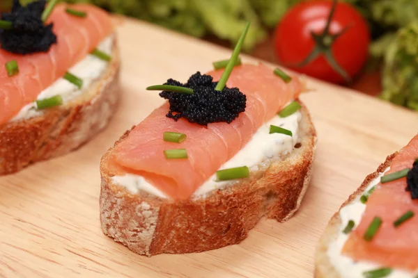 Fingerfood with smoked salmon — Stock Photo, Image