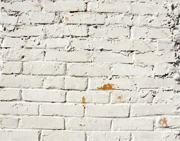 Fundo parede de tijolo vermelho pintado de tinta branca — Fotografia de Stock