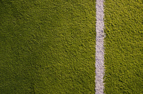 Линия маркировки синтетических спортивных площадок — стоковое фото