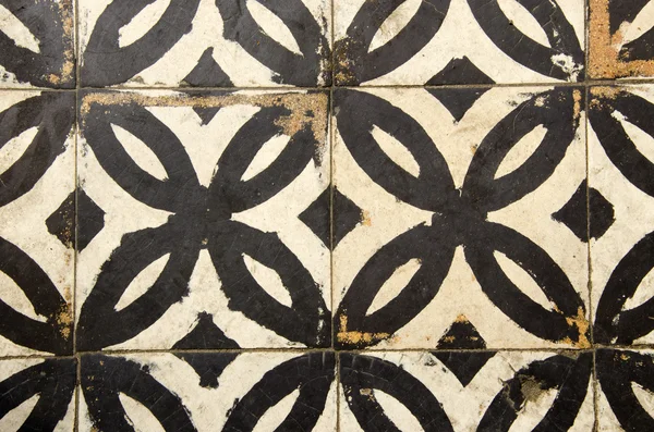 Antieke vloer tegels vrijkomen achtergrond in gang. — Stockfoto