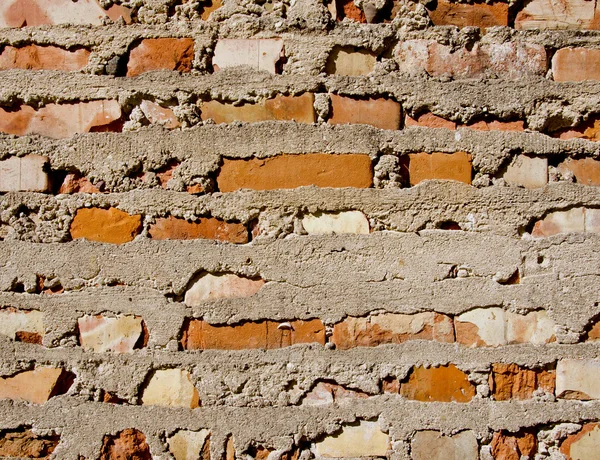 Vecchio mattone rosso e sfondo muro di cemento — Foto Stock